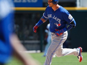 Toronto Blue Jays' Troy Tulowitzki rounds the bases after hitting a solo home run against the Chicago White Sox during the eighth inning of a baseball game in Chicago, Sunday, June 26, 2016. (AP Photo/Nam Y. Huh)
