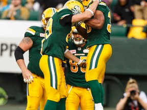 John White celebrates a touchdown against the Ottawa RedBlacks Saturday at Commonwealth Stadium. (Ian Kucerak)