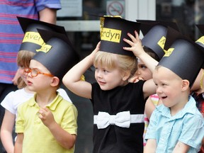 A shy and sad Dani Vosper (bottom row) remains seated while colleagues Max Docking (back row, left), Jordyn Schellenberger and Karson Wolfe participate in a little song prior to the start of the Perth Care for Kids pre-school graduation at the facility June 15. This week is graduation week, with area Grade 8 and Grade 12 students moving up and onward, and no doubt will be feeling some of the same emotions as young Dani. ANDY BADER MITCHELL ADVOCATE