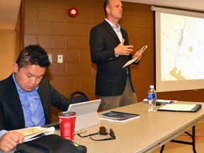 Planner Dennis Kwan (left) and principal planner Steve Langlois, of Monteith Brown Planning Consultants, presented a draft of the West Perth Recreation and Leisure Services Master Plan to the public at a June 21 meeting in the Mitchell Arena. GALEN SIMMONS MITCHELL ADVOCATE