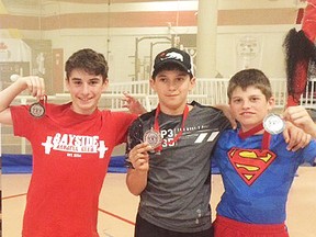 From left, Ayden Allin, Paul Destun and Trot Davis will compete in weightlifting at the 2016 Ontario Summer Games in August in Mississauga. Absent from the photo is Ryan Haire.