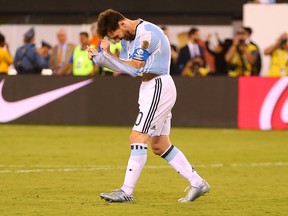 Lionel Messi of Argentina reacts after missing a penalty kick against Chile during the Copa America Centenario Championship match at MetLife Stadium in East Rutherford, N.J., on June 26, 2016. (Mike Stobe/Getty Images/AFP)