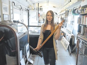 Madeline Sykes holds an iron mallet, a replica of the kind of tool used to embed spikes into the ground along the railroad. The Chatham Railroad Museum is located across from the VIA Rail station in Chatham, and will host all-day crafts and drop-in events this Canada Day.