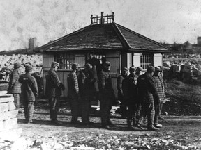 Archive photographs of prison inmates in their checkered uniforms, in work gangs on the streets of Kingston during the early 1900s. (Supplied by Simonne Ferguson)