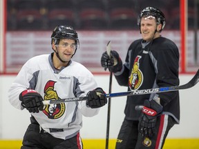 Clarke MacArthur and Dion Phaneuf (right) at the Ottawa Senators practice at Canadian Tire Centre last season. (Wayne Cuddington/Postmedia Network)