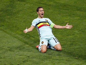 Belgium's Eden Hazard celebrates scoring a goal during the Euro 2016 Round of 16 match between Hungary and Belgium, at the Stadium municipal in Toulouse, France, on June 26, 2016. (AP Photo/Francois Mori)