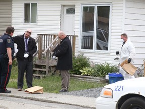 Greater Sudbury Police officers, detectives and forensic officers were investigating at a semi-detached home at 11B Peter St. in Copper Cliff, Ont. on Sunday June 26, 2016. A 34-year-old man suffered life-threatening injuries during an altercation with a 31 year-old man from St. Charles, who was arrested and charged with attempted murder. The injured male was transported to Health Sciences North, where he remains in critical but stable condition.Gino Donato/Sudbury Star/Postmedia Network