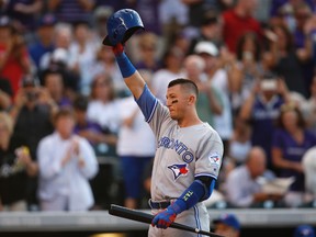 Toronto Blue Jays shortstop Troy Tulowitzki acknowledges the ovation from the crowd as he steps into the batter’s box against the Colorado Rockies Monday, June 27, 2016, in Denver. (AP Photo/David Zalubowski)