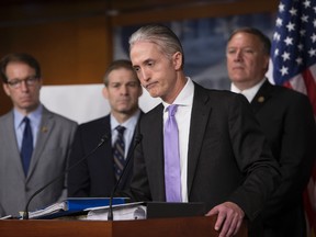 House Benghazi Committee Chairman Rep. Trey Gowdy, R-S.C., second from right, joined by other Republican members of the panel, discusses the release of his final report on the 2012 attacks on the U.S. consulate in Benghazi, Libya, where a violent mob killed four Americans, including Ambassador Christopher Stevens, Tuesday, June 28, 2016, during a news conference on Capitol Hill in Washington. From left are, Rep. Peter Roskam, R-Ill., Rep. Jim Jordan, R-Ohio, Gowdy and Rep. Mike Pompeo, R-Kan. (AP Photo/J. Scott Applewhite)