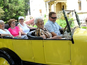 David Phelps takes four passengers from Tillsonburg Retirement Residence around the block from Annandale National Historic Site during Tillsonburg's sixth annual Turtlefest. (CHRIS ABBOTT/TILLSONBURG NEWS)