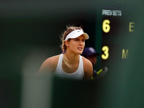 Eugenie Bouchard of Canada waits to receive a serve from Magdalena Rybarikova of Slovakia during their women's singles match on Day 2 of the Wimbledon Tennis Championships in London on June 28, 2016. (AP Photo/Alastair Grant)