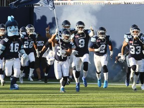 The Toronto Argonauts run onto BMO Field in Toronto Thursday June 23, 2016. (Veronica Henri/Postmedia Network)