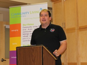 Kory Earle, President of People First of Canada speaks Thursday afternoon at the Community Living Belleville and Area office. Earle is working to create respect and inclusion for people who have intellectual disabilities. In Belleville, Ont. Thursday, June 25, 2015. (Samantha Reed/Belleville Intelligencer/Postmedia Network)