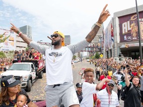 LeBron James of the Cleveland Cavaliers celebrates during the Cleveland Cavaliers 2016 championship victory parade and rally on June 22, 2016 in Cleveland. (Jason Miller/Getty Images/AFP)