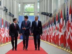 Prime Minister Justin Trudeau (centre), Mexican President Enrique Pena Nieto (left) and U.S. President Barack Obama take part in the North American Leaders Summit at the National Gallery of Canada in Ottawa on Wednesday, June 29, 2016. THE CANADIAN PRESS/Sean Kilpatrick