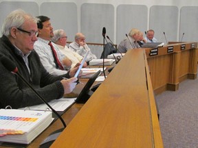 Point Edward Mayor Larry MacKenzie, left, and other Lambton County councillors listen to the county's 2016 budget proposal in Feburary 2016. MacKenzie has stepped down as mayor. Paul Morden/Sarnia Observer/Postmedia Network