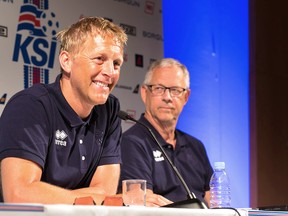 Iceland joint-coaches Heimir Hallgrimsson, left, and Lars Lagerback speak to the media at their European Championship tournament base in Annecy, French Alps, Wednesday June 29, 2016. Iceland has become the darling of the European Championship thanks to its underdog status and an uncompromising 4-4-2 formation that has made the team unbeatable so far in France. (AP Photo/Ciaran Fahey)