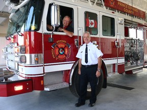 BRUCE BELL/THE INTELLIGENCER
Prince Edward County Mayor Robert Quaiff takes the municpality's new aerial fire truck for a road test on Wednesday morning under the watchful eye of Chief Scott Manlow. The truck was delivered on the weekend by Darch Fire in Ayr, ON, and boasts a 107-aerial ladder.
