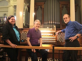 Beverly Koski, left, Michael Capon and Charlie Walker, in St. George's Cathedral in Kingston, Ont. on Monday, June 13, 2016, are helping organize a music festival dedicated to the organ. St. George's is one of the festival venues. Michael Lea The Whig-Standard Postmedia Network