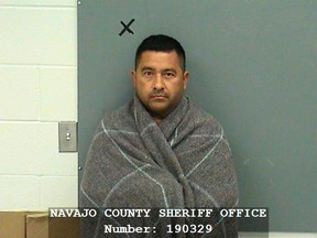 In this undated booking photo released by Navajo County Sheriff Office shows Salomon Diaz of Snowflake, Ariz., in Holbrook, Ariz. Diaz is facing murder and assault charges following a deadly shooting outside a courthouse in eastern Arizona that stemmed from a dispute over a custody hearing.  (Navajo County Sheriff Office via AP)