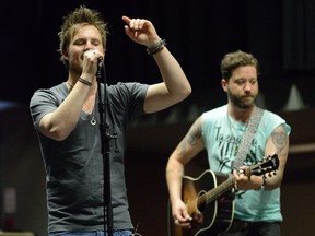 Jason Mercer, left, and Ryan Lynch of London-based country band Them Dang Rattlers, has learned to limit their London gigs to keep local fans wanting more. They play the Trackside Music Festival Saturday. (MORRIS LAMONT, The London Free Press)