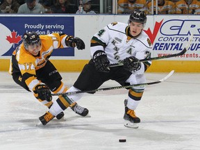 Aiden Jamieson of the London Knights battles against Jared Steege of the Kingston Frontenacs during an OHL game at Budweiser Gardens on Sept. 26, 2015 in London, Ont. The Sudbury Wolves traded for overage defenceman Jamieson on Wednesday. Claus Andersen/Getty Images/AFP