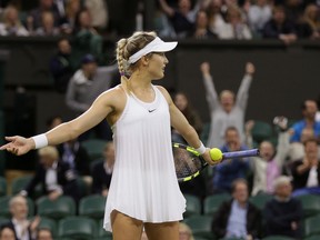 Eugenie Bouchard reacts to a video review as she wins her match with Magdalena Rybarikova at Wimbledon in London Wednesday, June 29, 2016. (AP Photo/Tim Ireland)