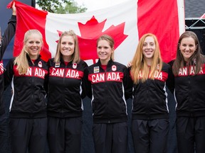 From left to right, Michael Woods, Kirsti Lay, Georgia Simmerling, Jasmin Glaesser, Allison Beveridge, Laura Brown and Tara Whitten pose as the Canadian Olympic Committee and Cycling Canada named the 19 athletes nominated to represent Team Canada in all cycling disciplines at the Rio Olympic Games in Ottawa on Wednesday, June 29, 2016. (Errol McGihon/Postmedia)