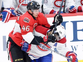 Ottawa Senators defenceman Patrick Wiercioch (46) cross checks Montreal Canadiens defenceman P.K. Subban (76) during the first period of game 3 of first round Stanley Cup NHL playoff hockey action in Ottawa on Sunday, April 19, 2015. Wiercioch went unpenalized on the play.