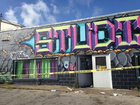 Police rope off the scene of a shooting at a Fort Worth, Texas dance studio early Saturday, June 25, 2016.  Fort Worth police spokesman Daniel Segura said homicide detectives were investigating at the studio, which sits on a state highway near a police station and multiple businesses and restaurants. (AP Photo/Emily Schmall)