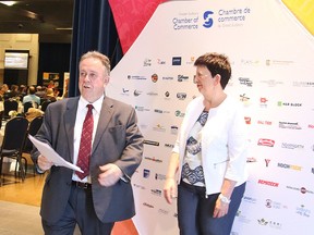 Michael Gravelle delivered the  keynote address as part of the Greater Sudbury Chamber of Commerce's President's Series in Sudbury, Ont. on Wednesday June 29, 2016. Chamber CEO Debi Nicholson looks on. Gino Donato/Sudbury Star/Postmedia Network