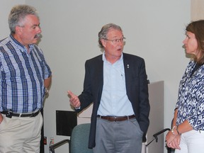 Keith Dempsey/for The Sudbury Star 
Dr. Jeff Turnbull, middle, speaks with Dr. Mike Franklyn and Maureen McLelland, Associate Vice President of Care Transitions at HSN, during a visit to Health Sciences North on Wednesday.