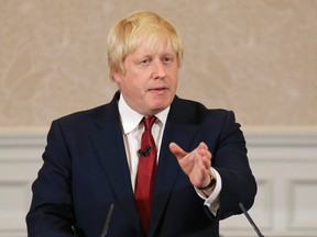 Former London mayor Boris Johnson announces that he will not run for  leadership of Britain's ruling Conservative Party in London, Thursday, June 30, 2016. The battle to succeed Prime Minister David Cameron as Conservative Party leader has drawn strong contenders with the winner set to become prime minister and play a vital role in shaping Britain's relationship with the European Union after last week's Brexit vote. (AP Photo/Matt Dunham)