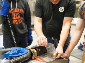 Loyalist College photo
Faculty and students of Loyalist College’s manufacturing engineering technician program help create new bike racks for the City of Belleville.