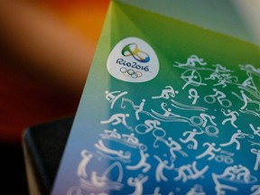 Close-up picture of the tickets for the Rio 2016 Olympic Games taken before printing at a ticket office in the Shopping Leblon mall in Rio de Janeiro, on June 20, 2016 as the Rio 2016 ticket offices for the Olympic and Paralympic Games open for sales and pick-ups in Brazil. / AFP PHOTO / YASUYOSHI CHIBA