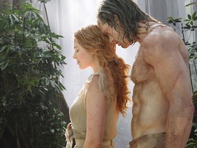 Margot Robbie, left, and Alexander Skarsgard in a scene from "The Legend of Tarzan."