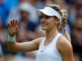 Eugenie Bouchard celebrates after beating Johanna Konta in their match at Wimbledon in London Thursday, June 30, 2016. (AP Photo/Alastair Grant)