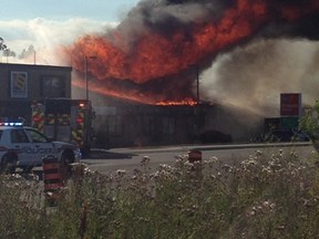 The Ontario Fire Marshal has concluded the fire that ripped through this Hyde Park strip mall in June was not set intentionally. (File photo)