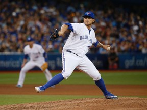 Toronto Blue Jays reliever Brett Cecil pitches against the Cleveland Indians in the seventh inning on June 30, 2016 at the Rogers Centre in Toronto. (JACK BOLAND/Toronto Sun)