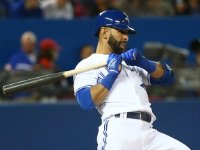 Blue Jays outfielder Jose Bautista is still in a walking boot after suffering a turf toe injury on his left foot on June 16. (Dave Abel/Toronto Sun)
