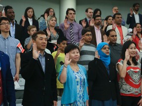 A citizenship ceremony takes place on Canada Day at the Markham Civic Centre on Friday, July 1, 2016. Veronica Henri/Toronto Sun/Postmedia Network