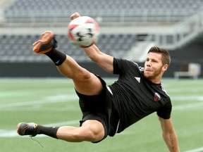 Ottawa Fury forward Carl Haworth shows off some skill while playing a game of soccer volleyball with three teammates at TD Place on June 27, 2016. (Julie Oliver/Postmedia)
