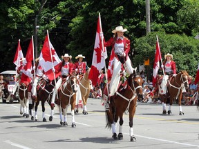 The Canadian Cowgirls march down Christina Street as part of Sarnia's Canada Day parade on Friday, July 1, 2016 in Sarnia, Ont. The annual parade started at Lakeshore and Colborne roads and ended in Canatara Park. (Terry Bridge/Sarnia Observer/Postmedia Network)