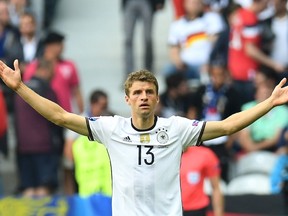 German midfielder Thomas Muller gestures during a Euro 2016 Round of 16 match against Slovakia at the Pierre-Mauroy stadium in Villeneuve-d’Ascq, near Lille, on June 26, 2016. (AFP PHOTO/PATRIK STOLLARZ)