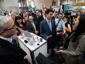 Prime Minister Justin Trudeau speaks to Canadian nuclear industry experts as he visits an nuclear industry expo taking place on the site of the Nuclear Security Summit in Washington, D.C., on Friday, April 1, 2016. THE CANADIAN PRESS/Sean Kilpatrick