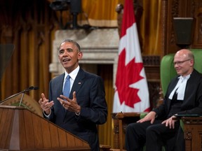 U.S. President Barack Obama addresses Parliament in the House of Commons on Parliament Hill, as House Speaker Geoff Regan looks on, in Ottawa on Wednesday, June 29, 2016. THE CANADIAN PRESS/Justin Tang