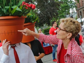 Ontario Premier Kathleen Wynne checks out a couple of potheads. Queens Park Canada Birthday Fest. started off with a big bang when Canadian Armed Forces did a 21-gun salute with three canons. Ontario Premier Kathleen Wynne was also on hand to meet the crowds on Friday July 1, 2016. Dave Thomas/Toronto Sun/Postmedia Network