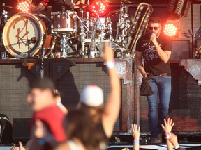 Randy Houser has 'em up and dancing as he performs Friday night at Trackside Music Festival at the Western Fair District. (MIKE HENSEN, The London Free Press)