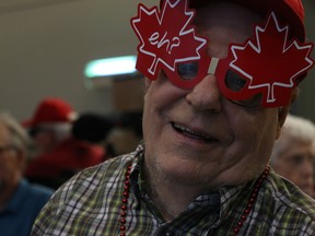 Howard Lindsay, 84, takes part in the Canada Day festivities with his daughter, at The Perley and Rideau Veterans' Health Centre.