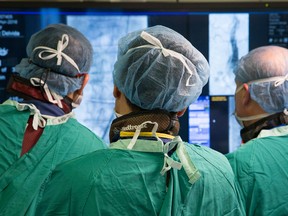 Surgery photos during a minimally invasive surgical procedure in the new, high tech operating room at the Ottawa Hospital.(Wayne Cuddington, Postmedia Network)